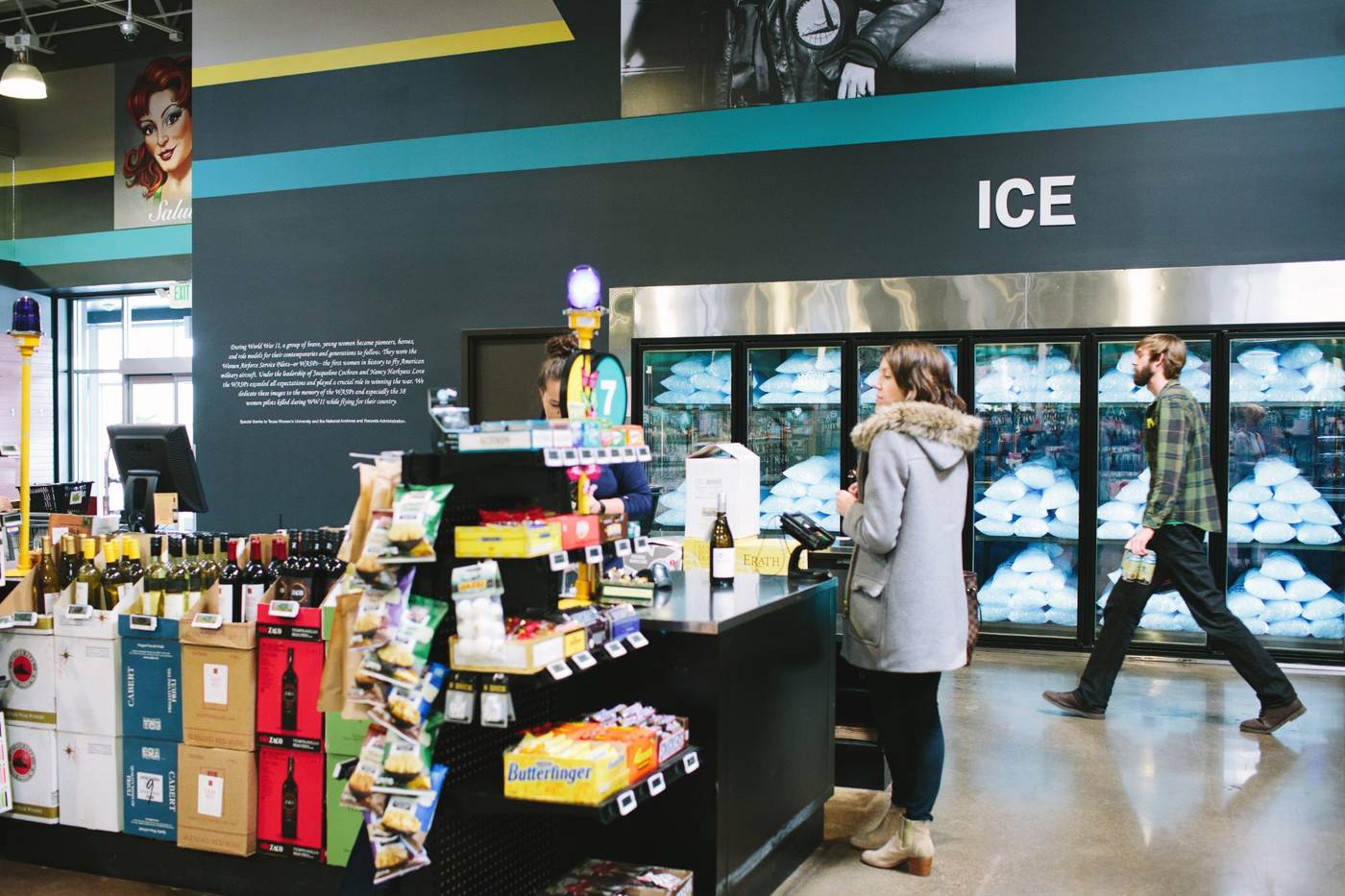 A customer at the coolers of a real mPower customer store